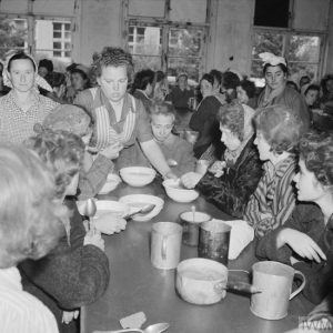 THE LIBERATION OF BERGEN-BELSEN CONCENTRATION CAMP, APRIL 1945 (BU 4853) Women inmates enjoy a meal of hot soup in one of the huts. Copyright: © IWM. Original Source: http://www.iwm.org.uk/collections/item/object/205194184