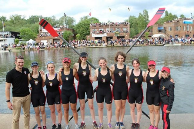 Somerville women's rowing team standing by the river