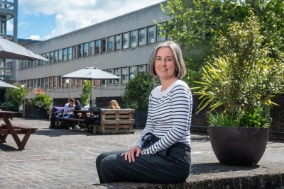 Jo Ockwell sitting on the terrace