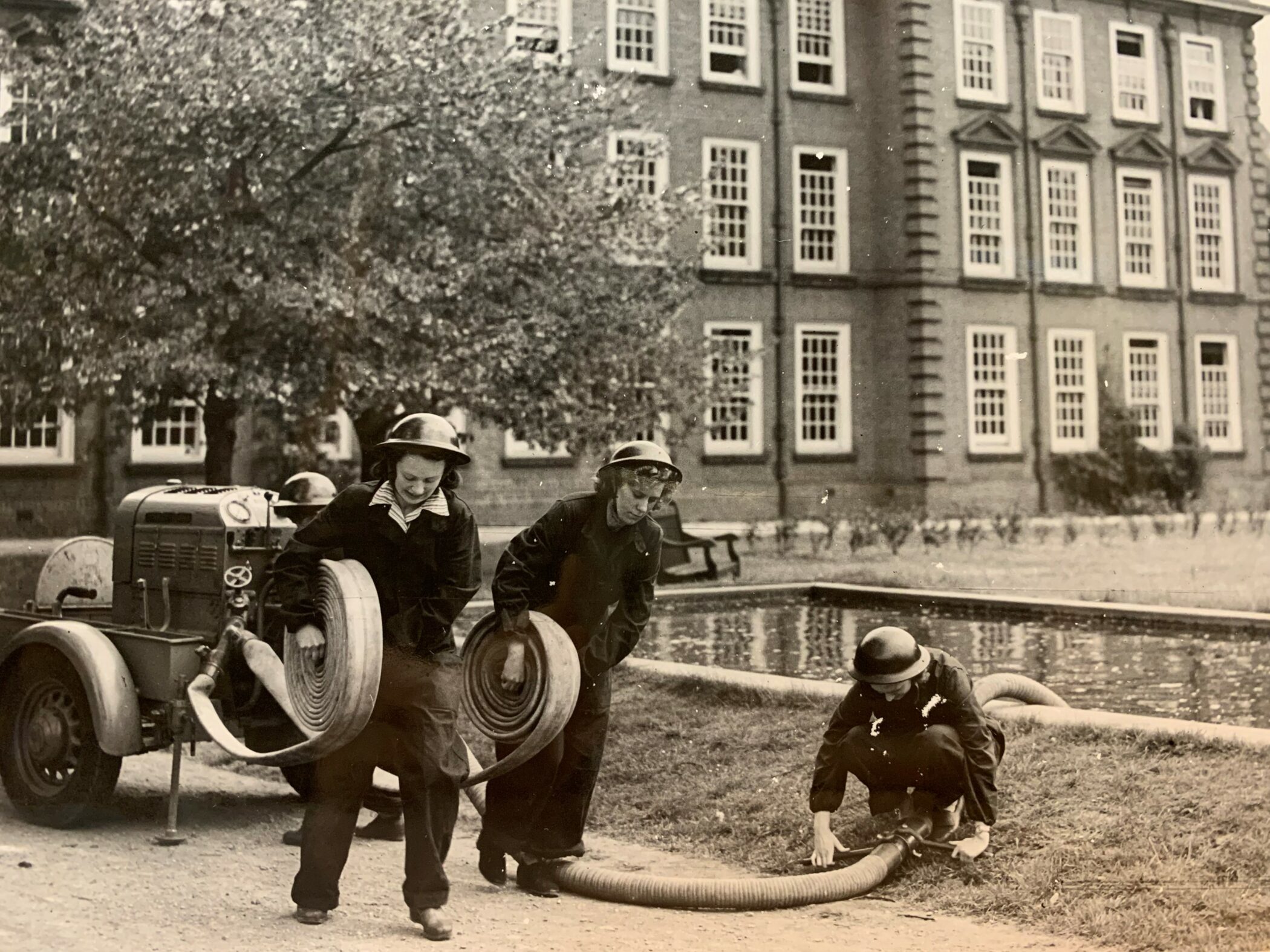 Somerville volunteer fire wardens train for a fire drill during World War Two