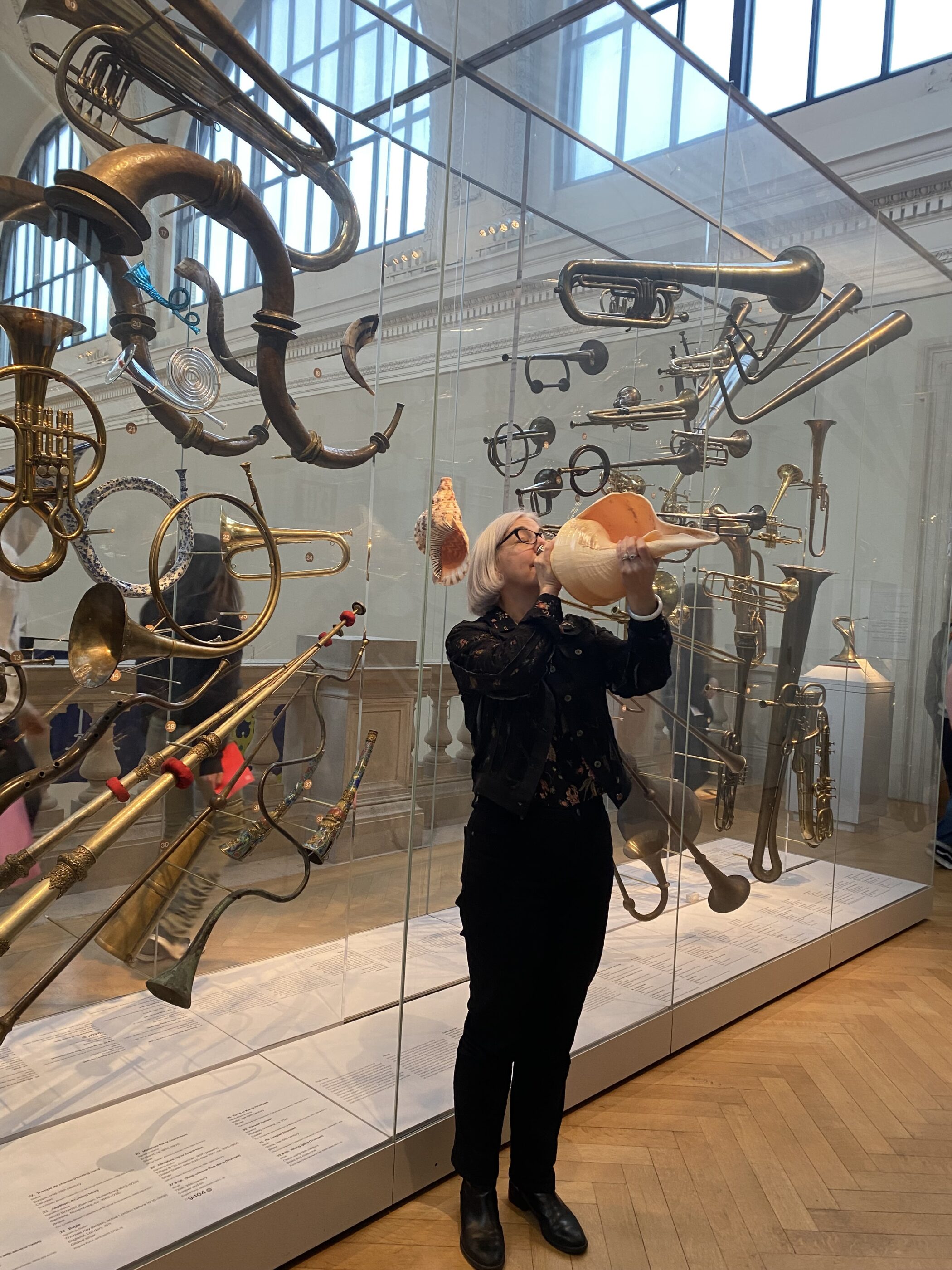 Dr Bradley Strauchen, curator at the Metropolitan museum of art, demonstrates playing a conch