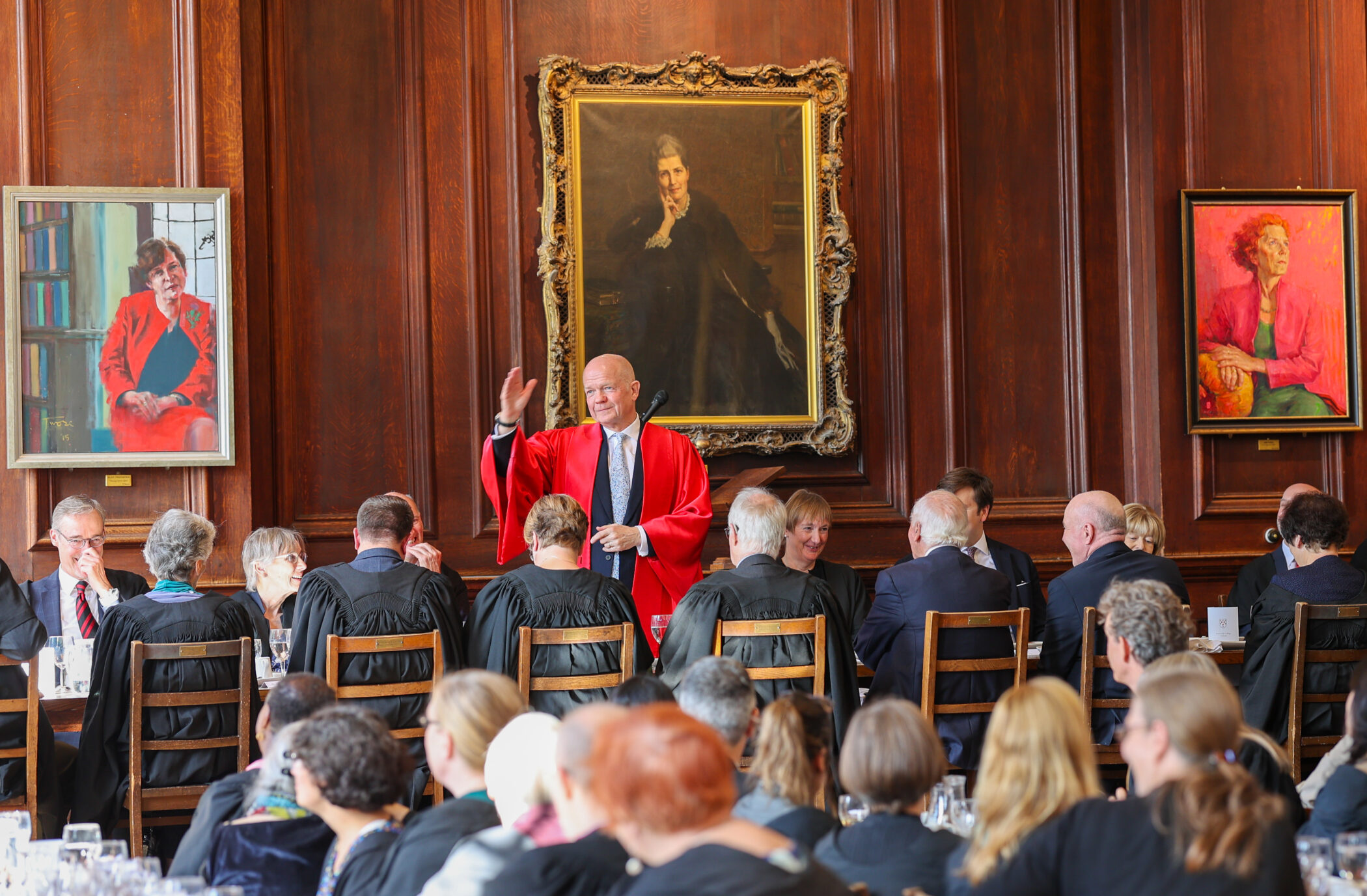 Lord Hague entertains guests with a witty encomium to Somerville and Oxford following the ceremony to admit Catherine Royle as Principal
