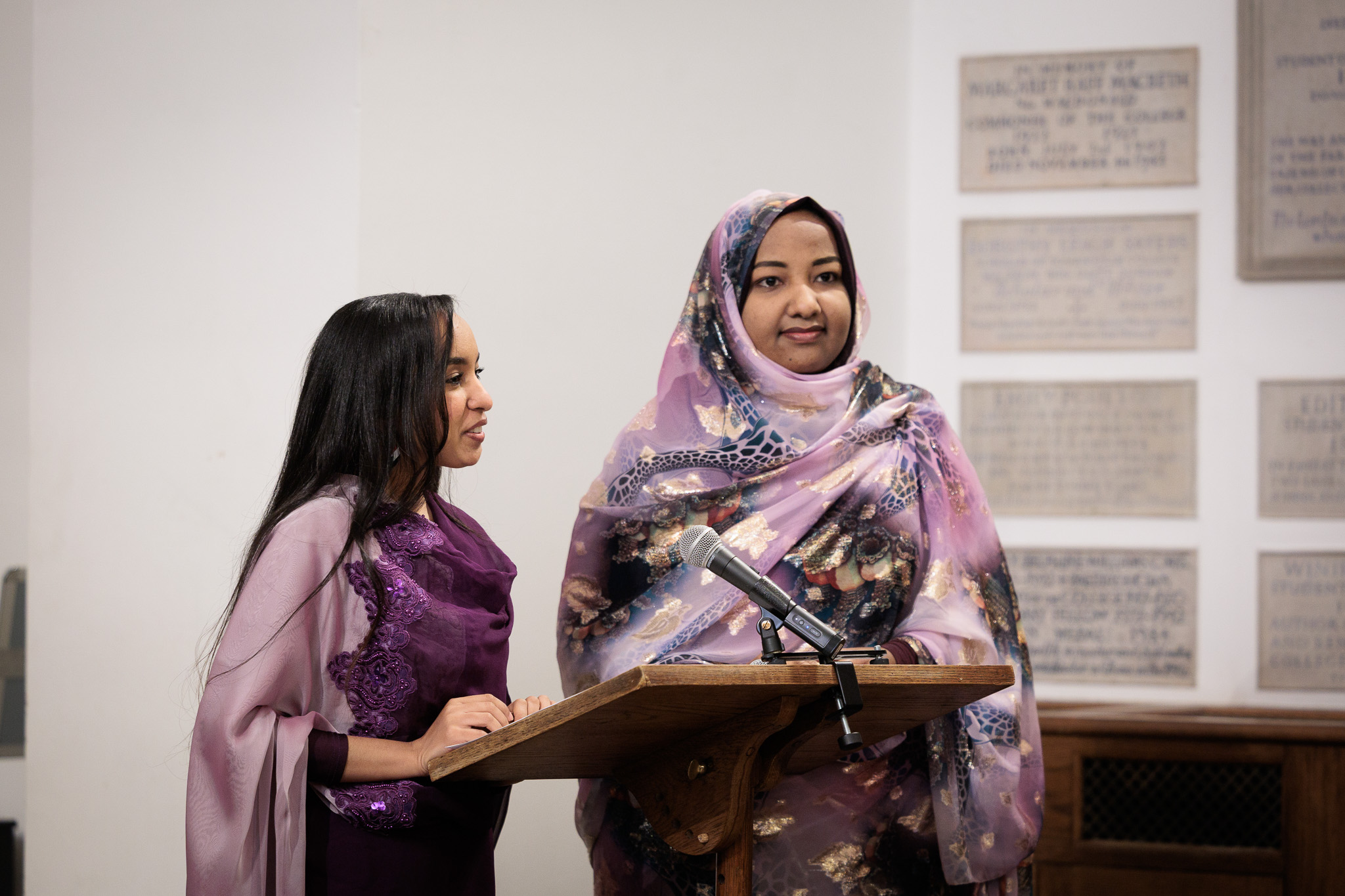 Sanctuary Scholars Hadeel Abdelseid and Zainab Mohamed address the audience