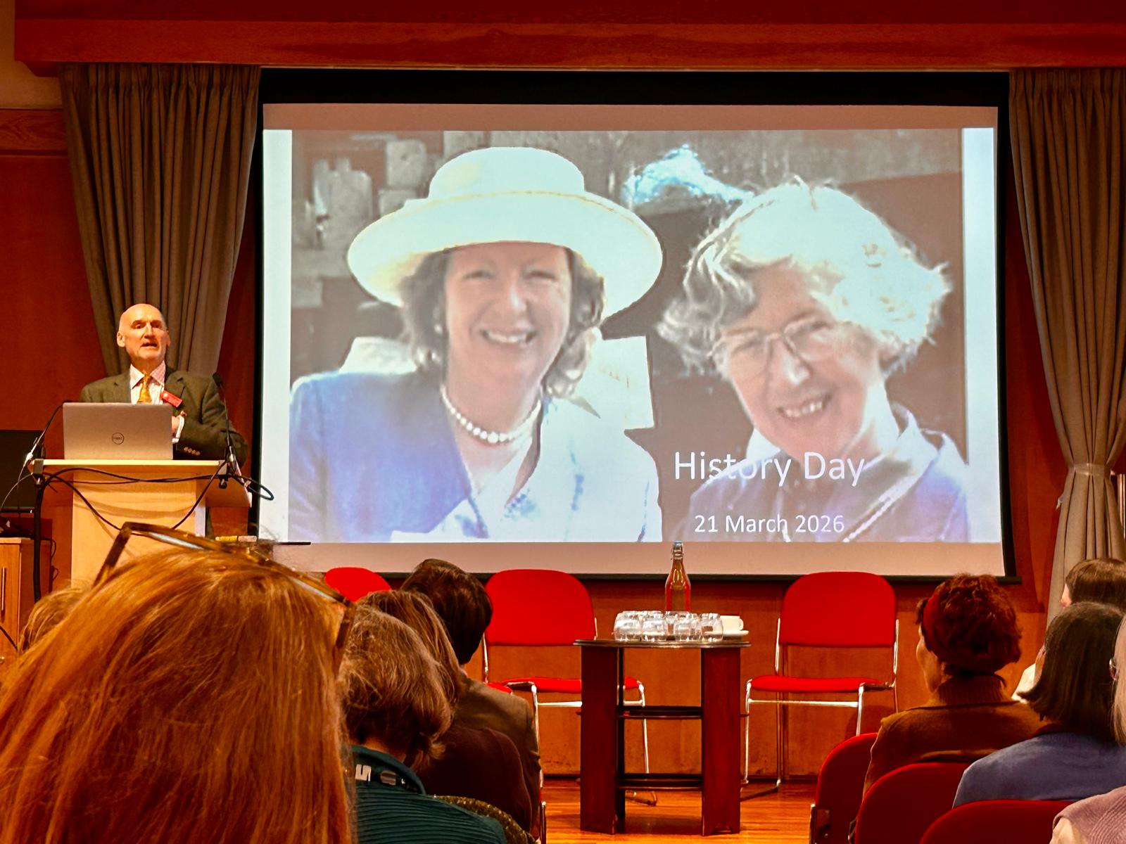 Liz Cooke Fellow and Tutor in Medieval History, Benjamin Thompson, introduces the day, with Fellow Emerita Barbara Harvey and Liz Cooke, Secretary of the Somerville Association 1988-2023, on the screen next to him